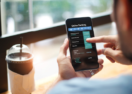 person banking on their phone