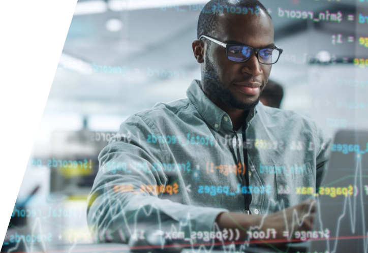 man at computer analyzing code shown digitally representing a customer experience data analytics platform